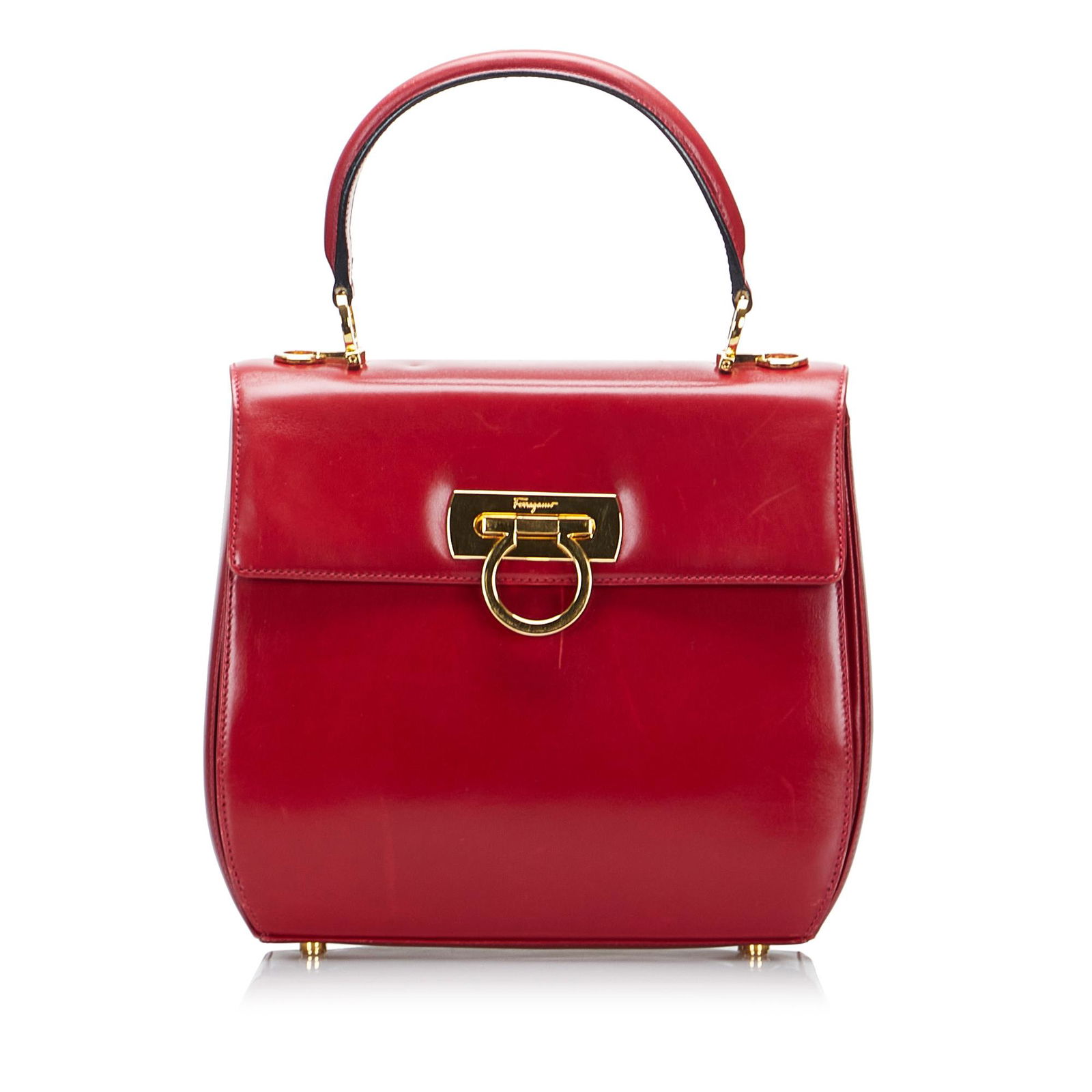 Ferragamo Gancini Satchel: Ferragamo Gancini Satchel This satchel features a leather body a flat leather top handle a detachable strap a front flap with a flip lock closure and an interior zip pocket. Brand: Ferragamo Model: Ga