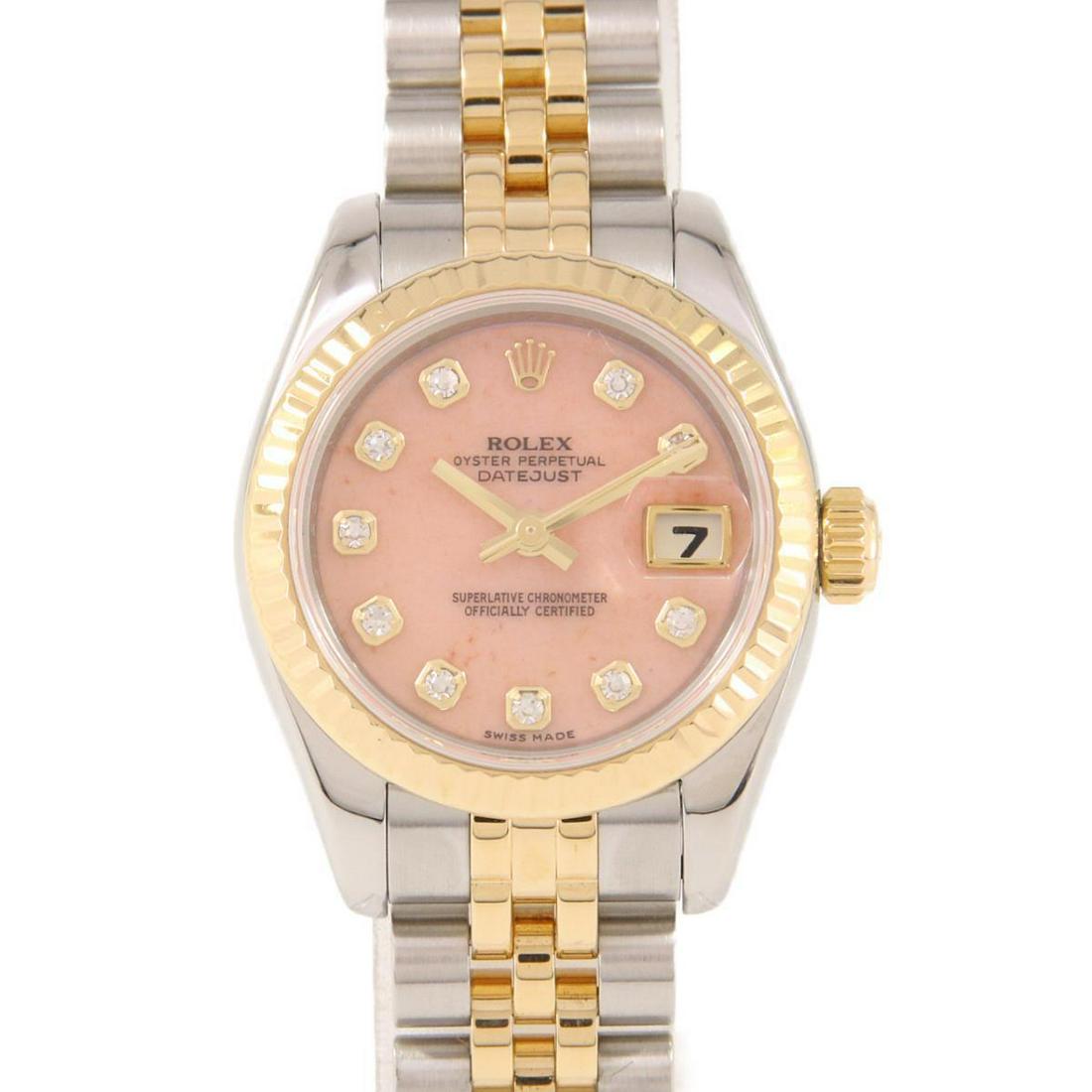ROLEX 179173OPG Datejust SSxYG Automatic: ROLEX 179173OPG Datejust SSxYG Automatic Color: Pink opal Diamond Size: Case diameter 26mm Max Arm size: 15cm Accessories: With genuine box Type: Wristwatch AB: Very Good The BIDHAUS Guarantee: All it