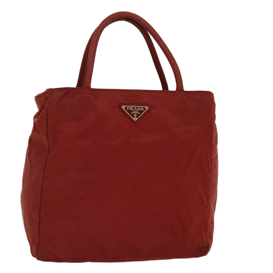 PRADA Hand Bag Nylon Red: PRADA Hand Bag Nylon Red Style: Hand Bag Material: Nylon Exterior Color: Red Bag Height: 10.6inch(Approx) / 27cm(Approx) Bag Depth: 3.9inch(Approx) / 10cm(Approx) Bag Length: 11.4inch(Approx) / 29cm(A