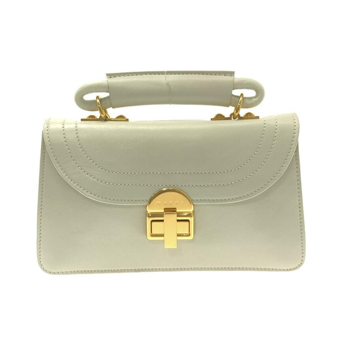 MARNI - BMMP0043Y1 Light gray Leather Handbag: MARNI - BMMP0043Y1 Light gray Leather Handbag Style: Handbag Exterior Color: Light gray Exterior Material: Leather Accessories: Dust Bag Shoulder Strap Type: Handbag B: Reasonable Wear and Tear The BI