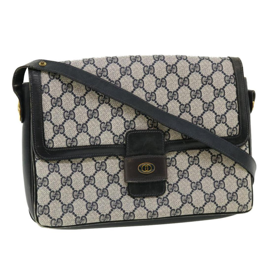 GUCCI GG Canvas Shoulder Bag PVC Leather Navy: GUCCI GG Canvas Shoulder Bag PVC Leather Navy Style: Shoulder Bag Material: PVC Leather Exterior Color: Navy Bag Height: 7.1inch(Approx) / 18cm(Approx) Bag Depth: 2.0inch(Approx) / 5cm(Approx) Bag Len