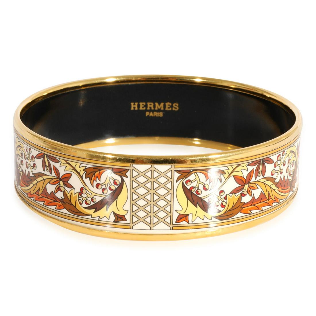 Hermes Plated Enamel Bracelet with Scrolling Leaves & Berry Clusters (62mm): Hermes Plated Enamel Bracelet with Scrolling Leaves & Berry Clusters (62mm) Gender: Unisex Metal: Gold Plated Gross Weight (Grams): 33.10 With Original Box/Packaging: No With Papers: No Collection: En