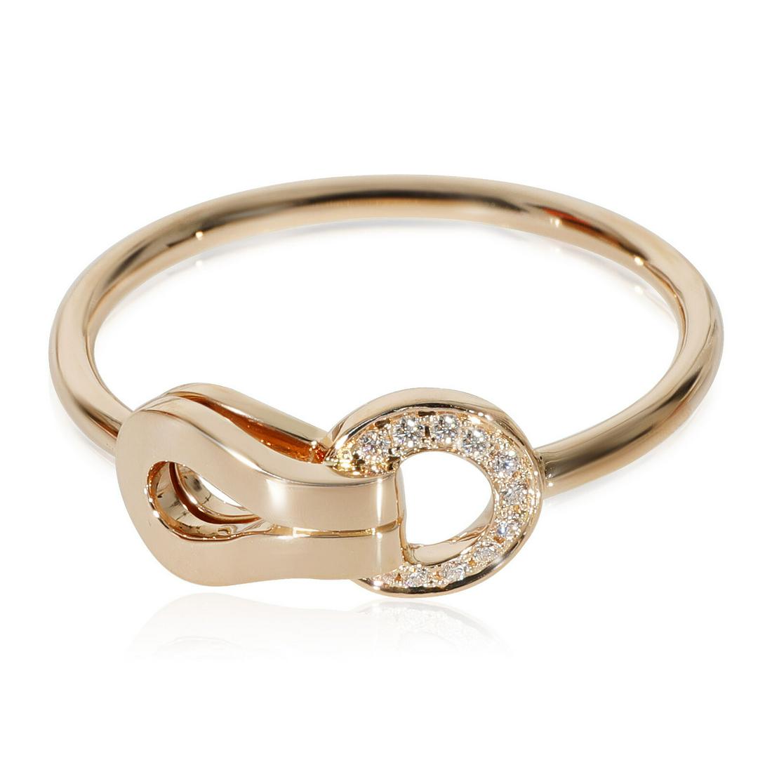 Cartier Agrafe Diamond Ring in 18k Rose Gold 0.03 CTW: Cartier Agrafe Diamond Ring in 18k Rose Gold 0.03 CTW Main Stone Color: White Gender: Unisex Metal: Rose Gold Total Carat Weight: 0.03 Size: 8.25 Gross Weight (Grams): 2.70 With Papers: No Shape: Roun
