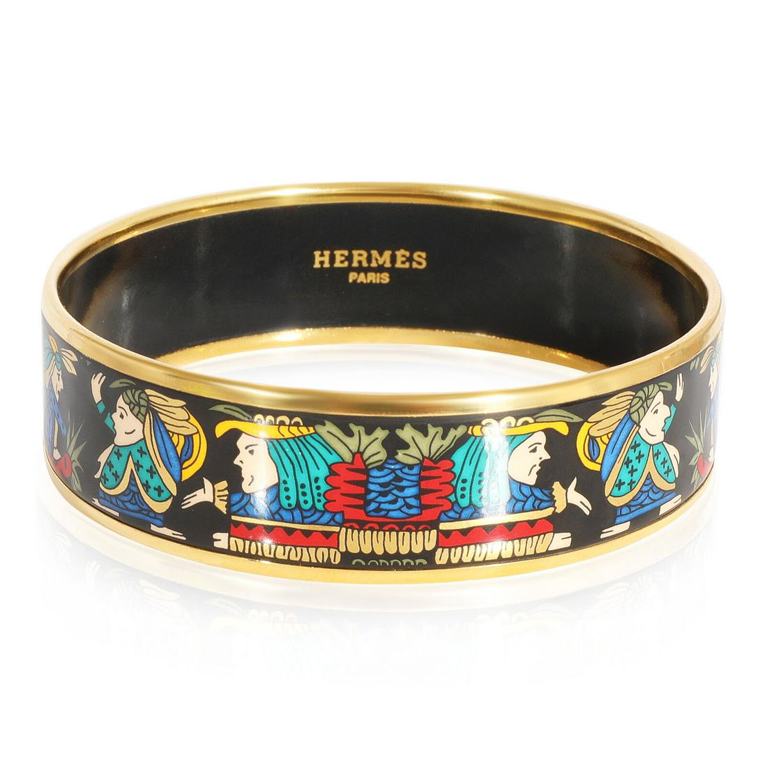 Hermes Plated Wide Enamel Black Background Bracelet with Faces (62MM): Hermes Plated Wide Enamel Black Background Bracelet with Faces (62MM) Gender: Unisex Metal: Gold Plated Gross Weight (Grams): 33.99 With Original Box/Packaging: No With Papers: No Collection: Enamel I