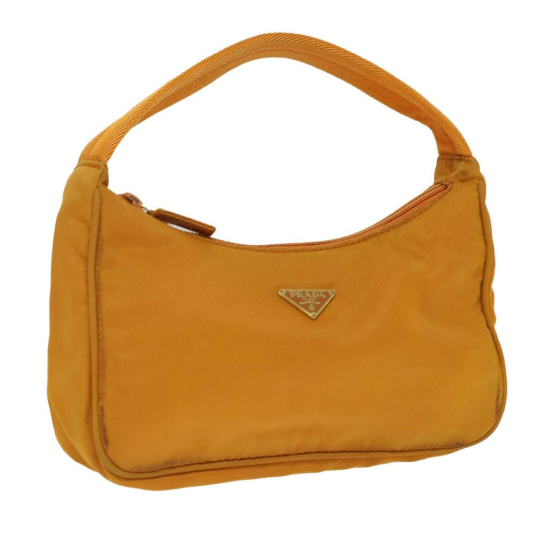 PRADA Pouch Nylon Orange: PRADA Pouch Nylon Orange Style: Pouch Material: Nylon Exterior Color: Orange Bag Height: 4.7inch(Approx) / 12cm(Approx) Bag Depth: 2.6inch(Approx) / 6.5cm(Approx) Bag Length: 8.3inch(Approx) / 21cm(Ap