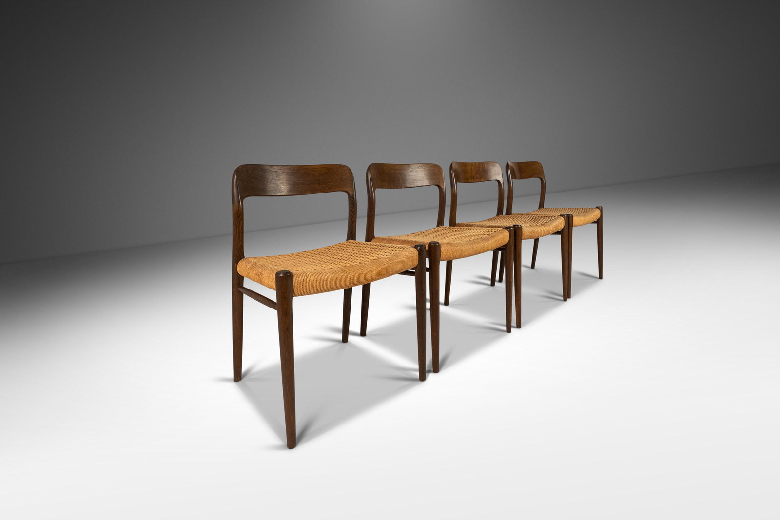 Set of Four ( 4 ) Niels Otto Moller Model 75 Dining Chairs for J.L. Mollers Mobelfabrik in Walnut: Set of Four ( 4 ) Niels Otto Moller Model 75 Dining Chairs for J.L. Mollers Mobelfabrik in Walnut Tinted Oak and Paper Cord Denmark 1960s Set of Four ( 4 ) Niels Otto Moller Model 75 Dining Chairs for