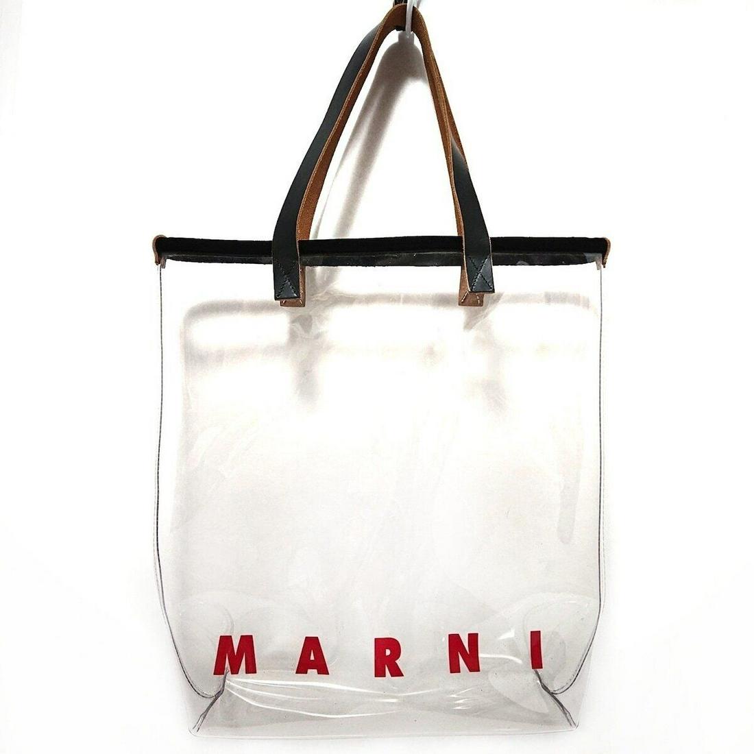 MARNI - SHMP0009A1 P2405 Clear Black Vinyl Velour Leather Tote Bag: MARNI - SHMP0009A1 P2405 Clear Black Vinyl Velour Leather Tote Bag Style: Tote Bag Exterior Color: Clear Black Exterior Material: Vinyl Velour Leather Accessories: Pouch (detachable) Inner Bag Type: T