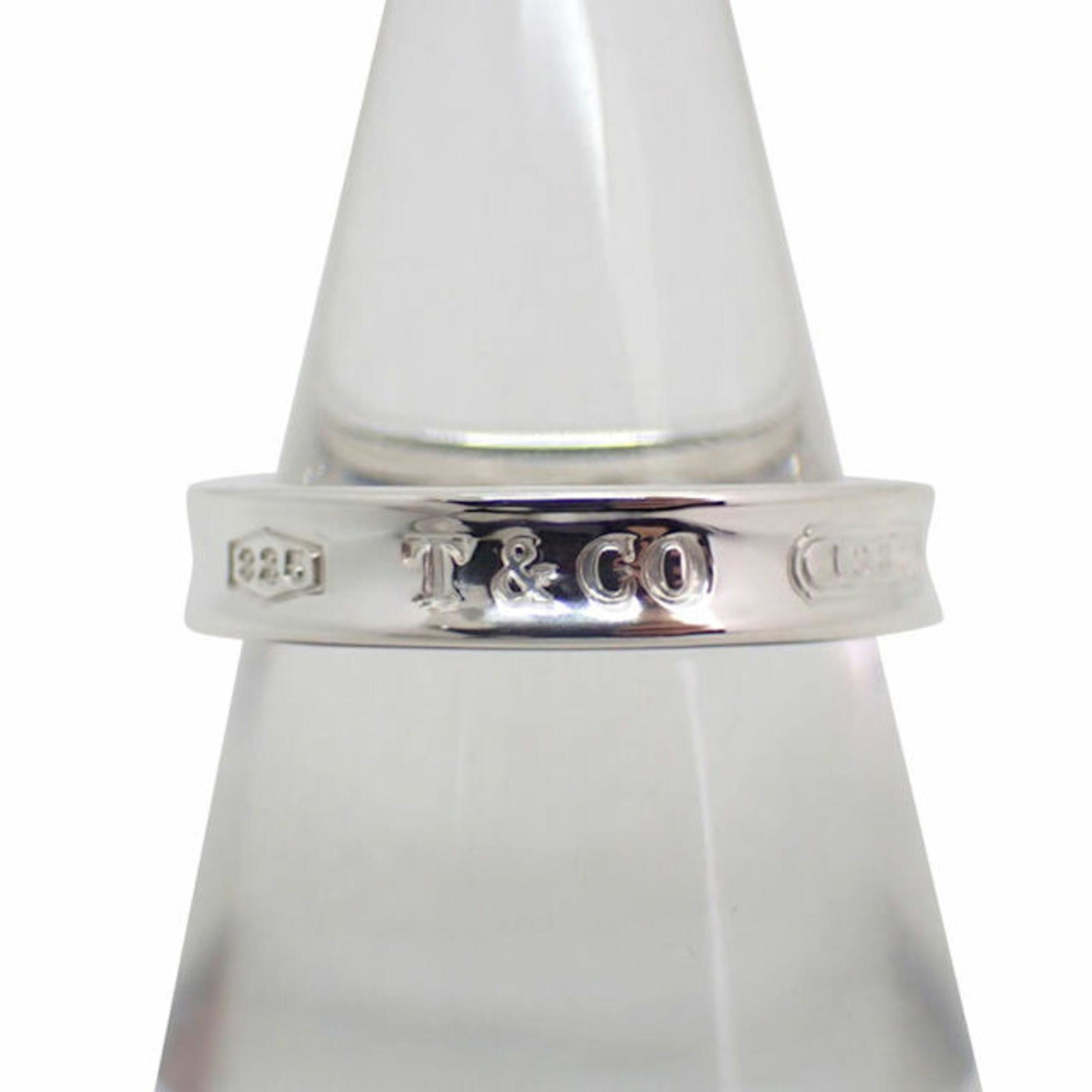 TIFFANY Tiffany 925 1837 narrow ring No. 10: TIFFANY Tiffany 925 1837 narrow ring No. 10 Brand: Tiffany Type: Band ring Gender: Women Material: Sterling silver 925 US Size: 5.5 Width: 3.9mm / 0.15 Weight: 3.8g / 0.13oz. Condition: Used (very goo