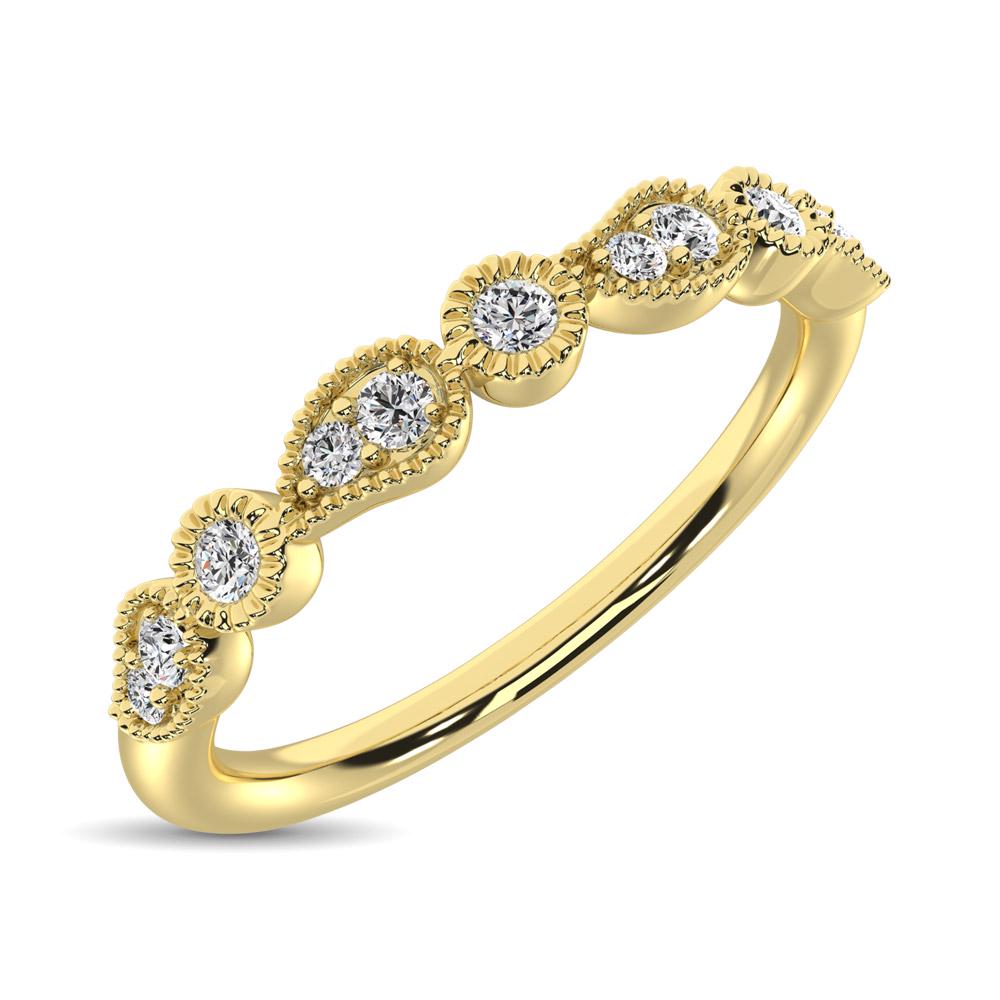 14K Yellow Gold 1/10 Ctw Diamond Stackable Band: 14K Yellow Gold 1/10 Ctw Diamond Stackable Band This beautiful ring is available in 14K Yellow Gold. There are 11 round diamonds with a total carat weight of 1/10 ct set in a Bezel / Shared prong sett