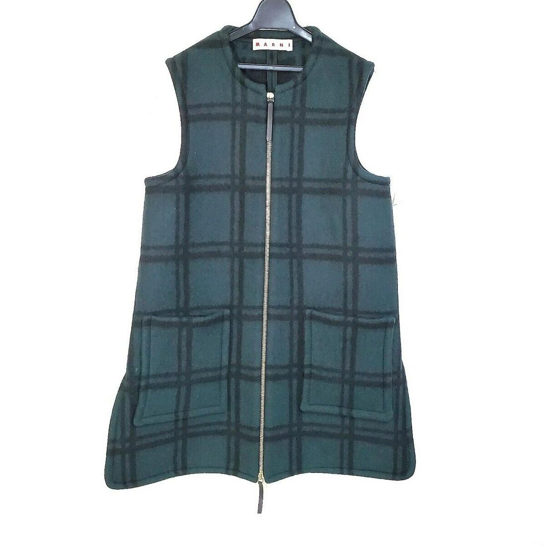 MARNI Dark Green Black Wool Womens Coat #40: MARNI Dark Green Black Wool Womens Coat #40 Style: Coat Color: Dark Green Black Outer Shell Material: Wool Accessories: None Type: Coat Size: 40 B: Reasonable Wear and Tear The BIDHAUS Guarantee: All