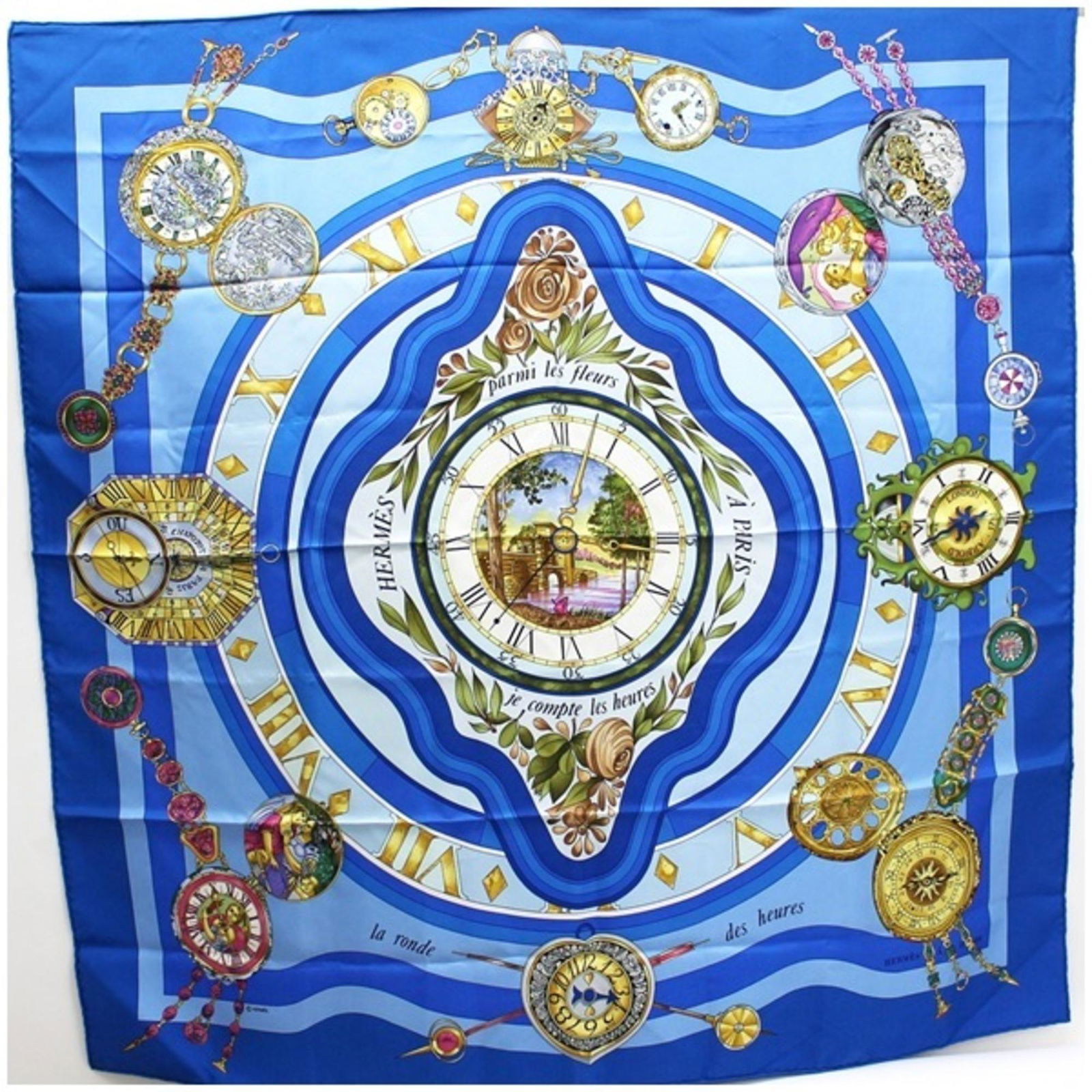 Hermes silk scarf muffler carre 90 parmi les fleurs je compte heures (time spent in flowers) HERMES: Hermes silk scarf muffler carre 90 parmi les fleurs je compte heures (time spent in flowers) HERMES ladies large tapestry Brand: Hermes Type: Scarf Gender: Women Color: Blue Material: Silk100% Silk: 1