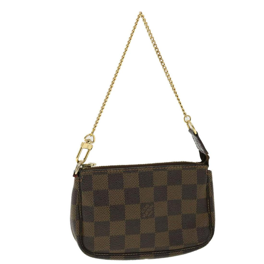 LOUIS VUITTON Damier Ebene Mini Pochette Accessoires Pouch N58009 LV: LOUIS VUITTON Damier Ebene Mini Pochette Accessoires Pouch N58009 LV Style: Accessory Pouch Material: Damier Ebene Canvas Exterior Color: Damie Ebene Bag Height: 3.7inch(Approx) / 9.5cm(Approx) Bag De