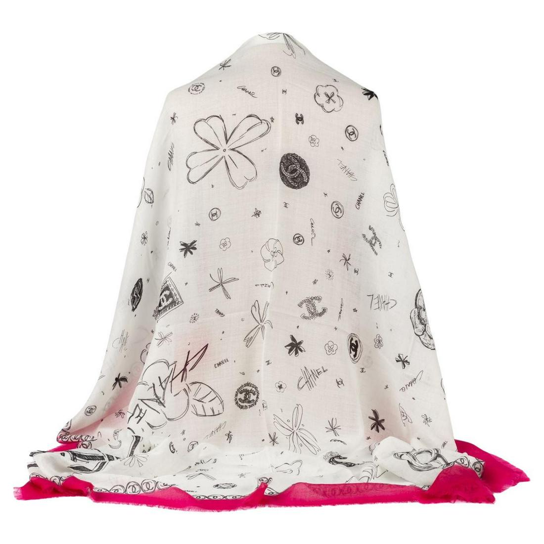 Chanel New White Fuchsia Cashmere Shawl: Chanel New White Fuchsia Cashmere Shawl Designer: Chanel Dimensions: Width: 52 in (132.08 cm)Length: 52 in (132.08 cm) Place of Origin: Italy Period: 21st Century Pre-Owned The BIDHAUS Guarantee: All