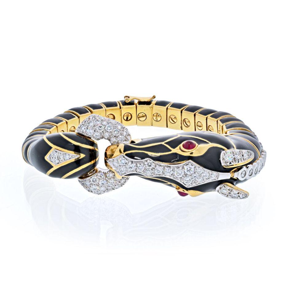 David Webb Platinum & 18K Yellow Gold Black Enamel And Diamond Horse Bracelet: David Webb Platinum & 18K Yellow Gold Black Enamel And Diamond Horse Bracelet Type: Bracelets Metal: Platinum & 18K Yellow Gold Grams: 125.5 Measurements: Wrist size 6.5 inches Condition: Very Good. S