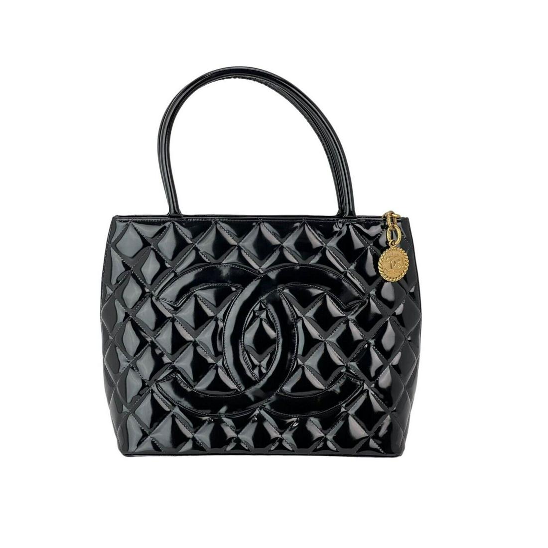CHANEL Patent Medallion Black Vintage Tote 24K Hardware: CHANEL Patent Medallion Black Vintage Tote 24K Hardware Bag Width: 12 in Shape: Rectangle Closure: Zip Handle/Strap Color: Black Occasion: Casual Formal Party/Cocktail Size: Medium Hardware Color: Gol