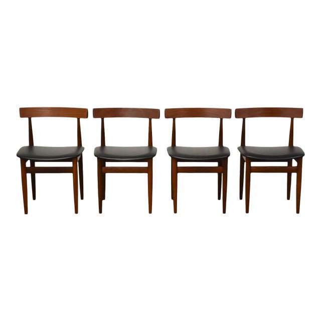 Hans Olsen Walnut Dining Chairs- Set of 4: Hans Olsen Walnut Dining Chairs- Set of 4 A set of four mid century modern walnut dining chairs designed by Hans Olsen for Frem Rojle. Seat height is 16.5" 18" wide. 17.25" deep. 28" tall. Dimensions: