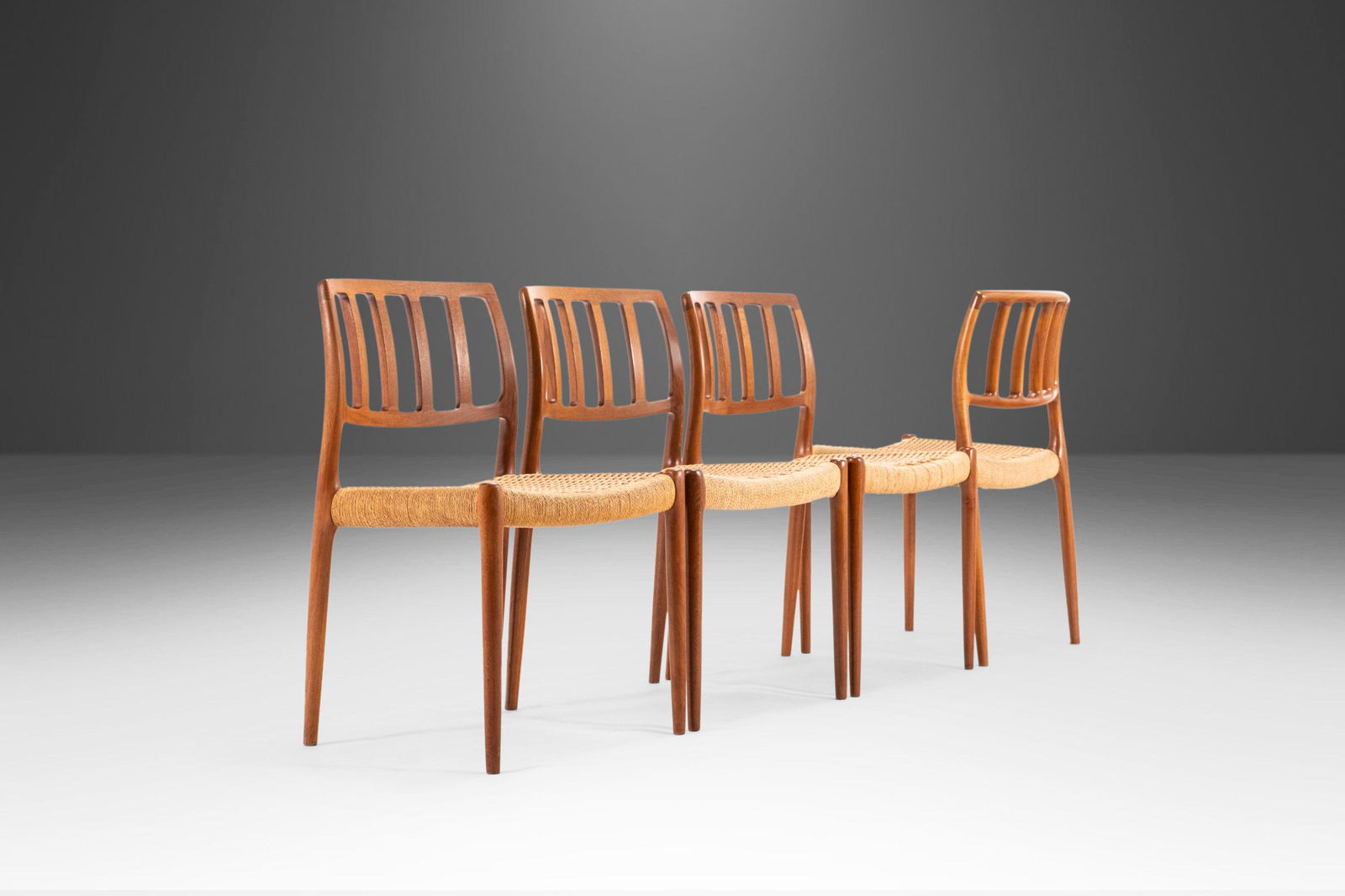 Set of Four (4) Model 83 Teak Dining Chairs Niels Otto Moller for J.L. Moller w/ Paper Cord Seats: Set of Four (4) Model 83 Teak Dining Chairs Niels Otto Moller for J.L. Moller w/ Paper Cord Seats Denmark c. 1970s Set of Four (4) Model 83 Teak Dining Chairs Niels Otto Mller for J.L. Mller w/ Paper