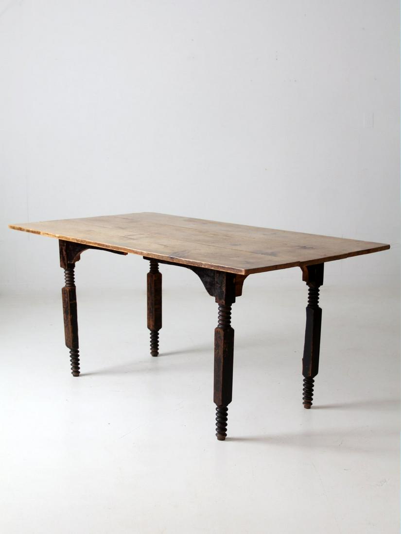 Antique Wood Dining Table: Antique Wood Dining Table This is an antique wooden dining table. The farmhouse table features turned legs and a three plank wood top. Height 29.75 inch 75.6 cm Length 63 inch 160 cm Width 35 inch 88.