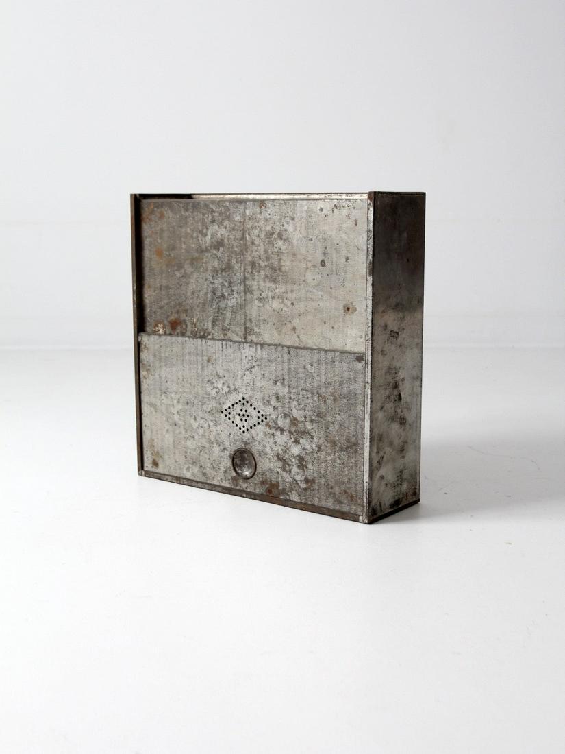 Vintage Metal Bread Box: Vintage Metal Bread Box A vintage metal bread box with sliding door. Beautifully weathered the aluminum box features a sliding door with a perforated vent. Height 19 inch 48.3 cm Length 18.5 inch 47 c