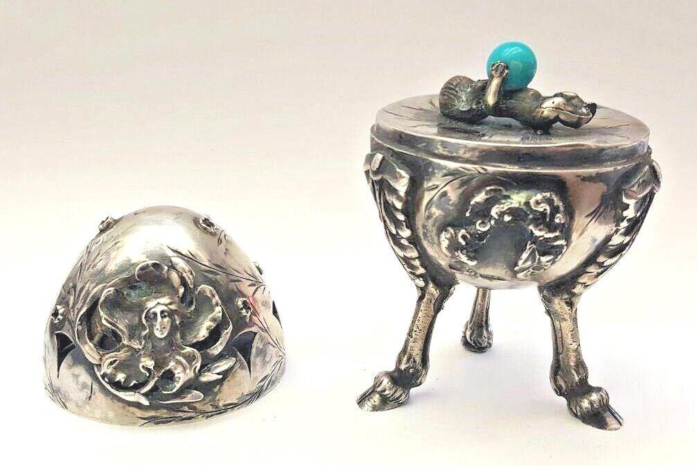CIRCA 1886 RUSSIAN EGG 84 SILVER WITH RUBY & BLUE STONE: CIRCA 1886 RUSSIAN EGG 84 SILVER WITH RUBY & BLUE STONE Age: 1886 Composition: Sterling Silver Pre-Owned PLEASE NOTE: LOCAL PICK UP IS NOT AN OPTION AND ALL ITEMS IN THIS AUCTION MUST BE SHIPPED. We o