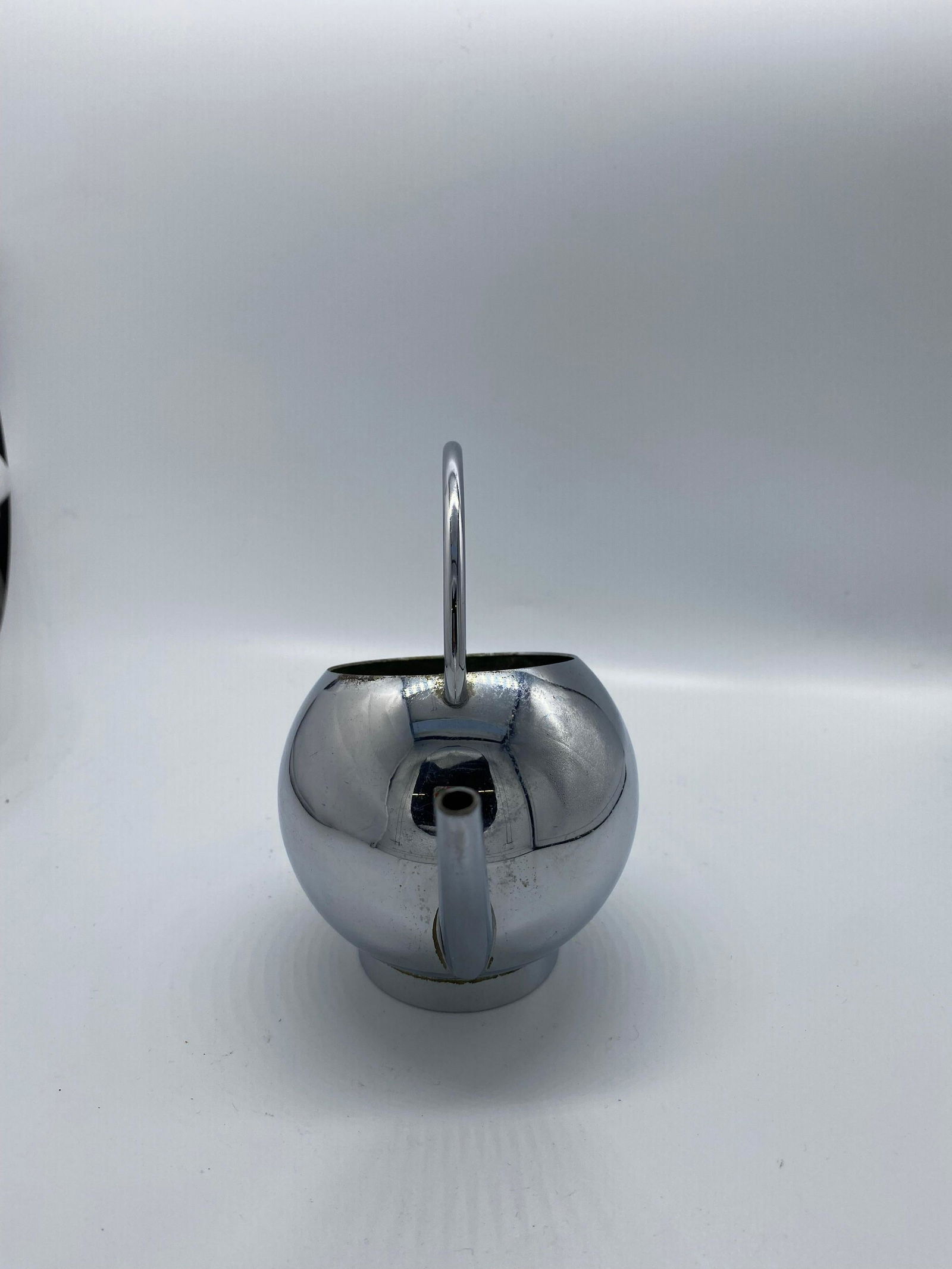 1934 Modernist Small Chrome Syrup Pitcher by Russel Wright for Chase Co.: 1934 Modernist Small Chrome Syrup Pitcher by Russel Wright for Chase Co. Creator: Chase Brass and Copper Company (Manufacturer) Dimensions: Height: 5.3 in (13.47 cm)Diameter: 2 in (5.08 cm) Materials