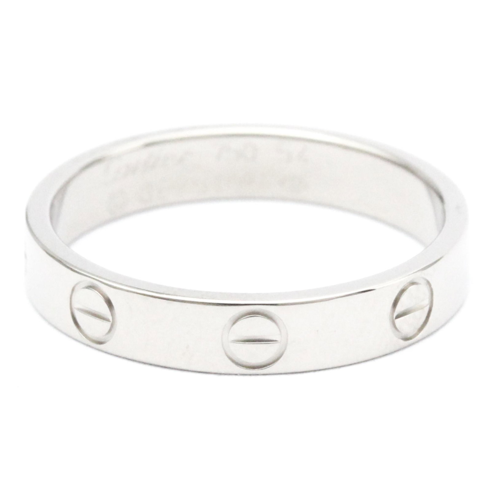 Polished CARTIER Mini Love Ring 18K White Gold BF560662: Polished CARTIER Mini Love Ring 18K White Gold BF560662 Brand: Cartier Line: Love Model: Mini Love Ring Type: Band ring Gender: Men Women Material: White gold (18K) US Size: 7-7.5 Other Size: 54 Width
