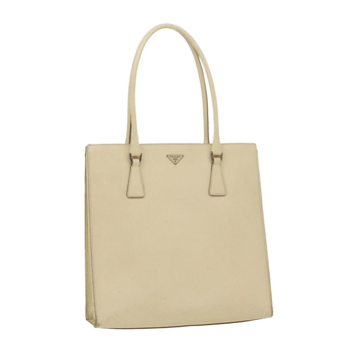 PRADA Tote Bag Leather White: PRADA Tote Bag Leather White Style: Tote Bag Material: Leather Exterior Color: White Bag Height: 11.8inch(Approx) / 30cm(Approx) Bag Depth: 2.8inch(Approx) / 7cm(Approx) Bag Length: 11.8inch(Approx) /