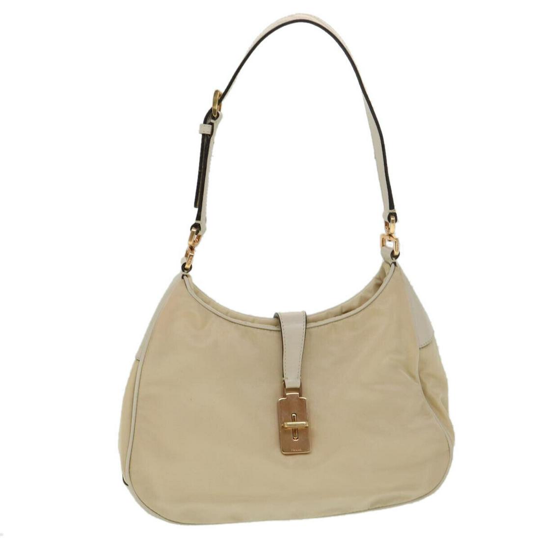 PRADA Shoulder Bag Nylon Beige: PRADA Shoulder Bag Nylon Beige Style: Shoulder Bag Material: Nylon Exterior Color: Beige Bag Height: 7.9inch(Approx) / 20cm(Approx) Bag Depth: 2.0inch(Approx) / 5cm(Approx) Bag Length: 9.8inch(Approx)