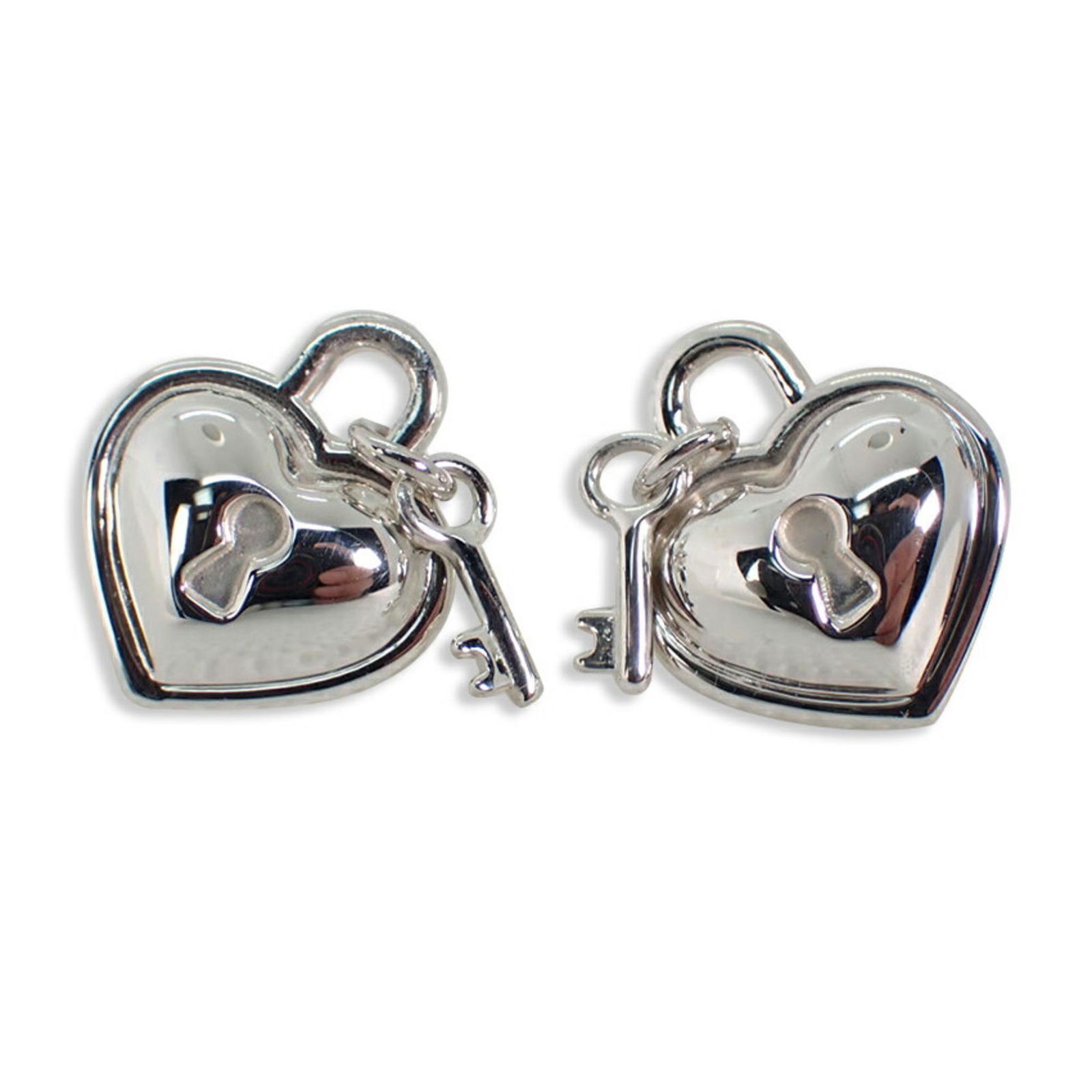 TIFFANY Tiffany SV925 heart key earrings: TIFFANY Tiffany SV925 heart key earrings Brand: Tiffany Type: Stud earrings Gender: Women Material: Sterling silver 925 Weight: 7.4g / 0.26oz. Condition: Used (very good) The BIDHAUS Guarantee: All it