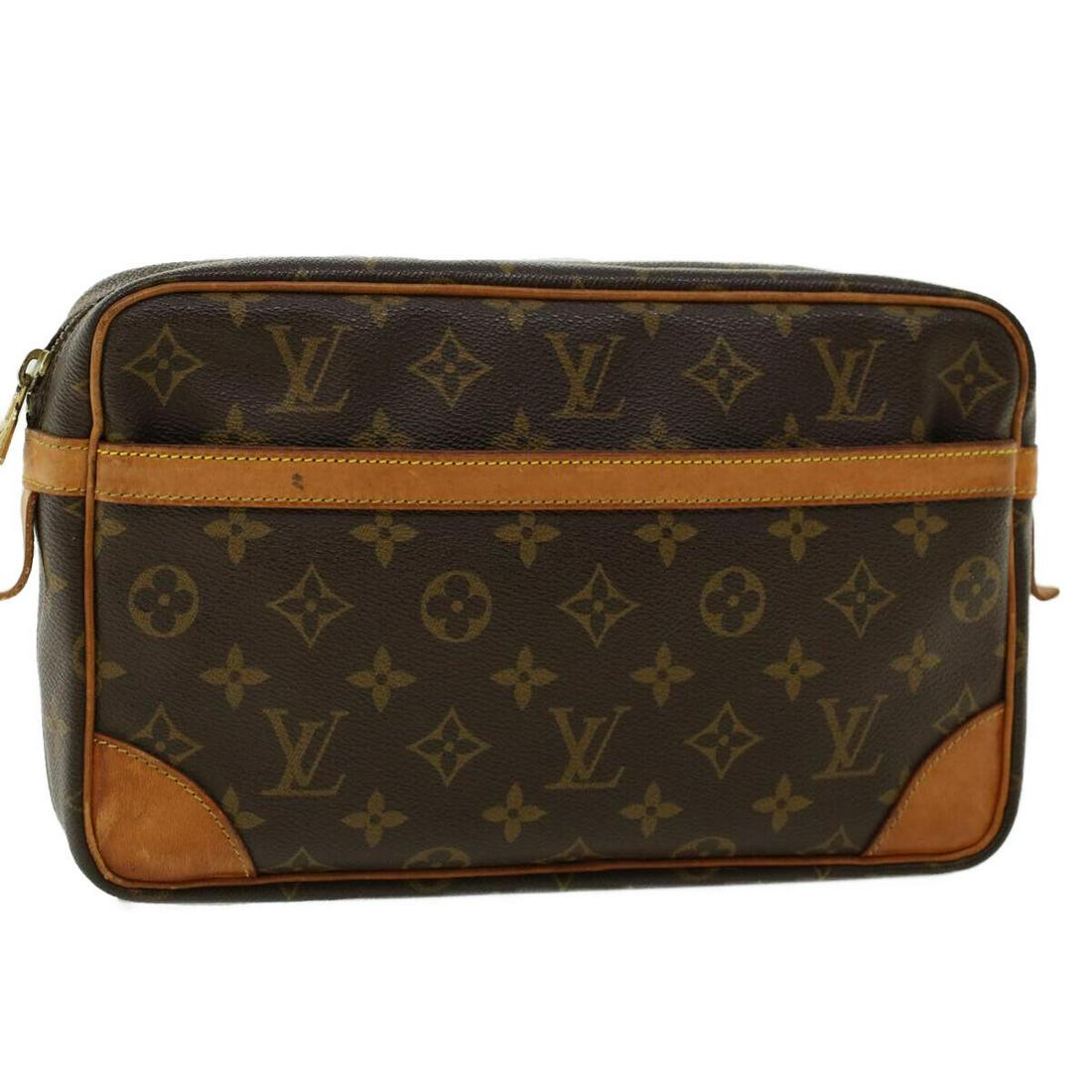LOUIS VUITTON Monogram Compiegne 28 Clutch Bag M51845 LV: LOUIS VUITTON Monogram Compiegne 28 Clutch Bag M51845 LV Style: Clutch Bag Material: Monogram Canvas Exterior Color: Monogram Bag Height: 7.1inch(Approx) / 18cm(Approx) Bag Depth: 2.8inch(Approx) / 7c