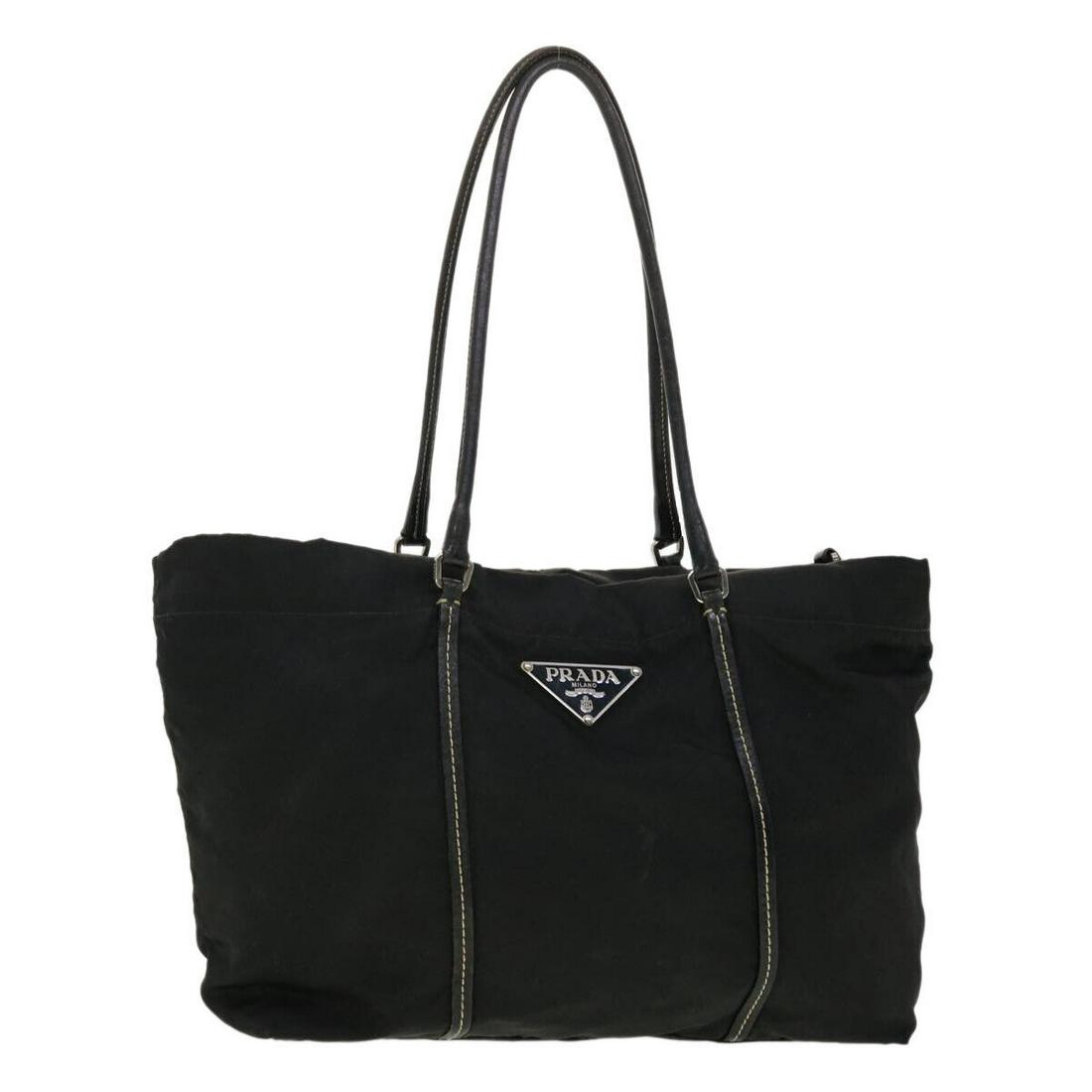 PRADA Shoulder Bag Nylon Black: PRADA Shoulder Bag Nylon Black Style: Shoulder Bag Material: Nylon Exterior Color: Black Bag Height: 9.1inch(Approx) / 23cm(Approx) Bag Depth: 3.9inch(Approx) / 10cm(Approx) Bag Length: 11.4inch(Appro