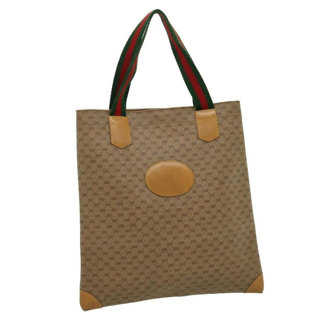 GUCCI Micro GG Canvas Web Sherry Line Tote Bag Beige Red 02371300: GUCCI Micro GG Canvas Web Sherry Line Tote Bag Beige Red 02371300 Style: Tote Bag Material: PVC Leather Exterior Color: Beige / Red Bag Height: 13.0inch(Approx) / 33cm(Approx) Bag Depth: 0.4inch(Appro