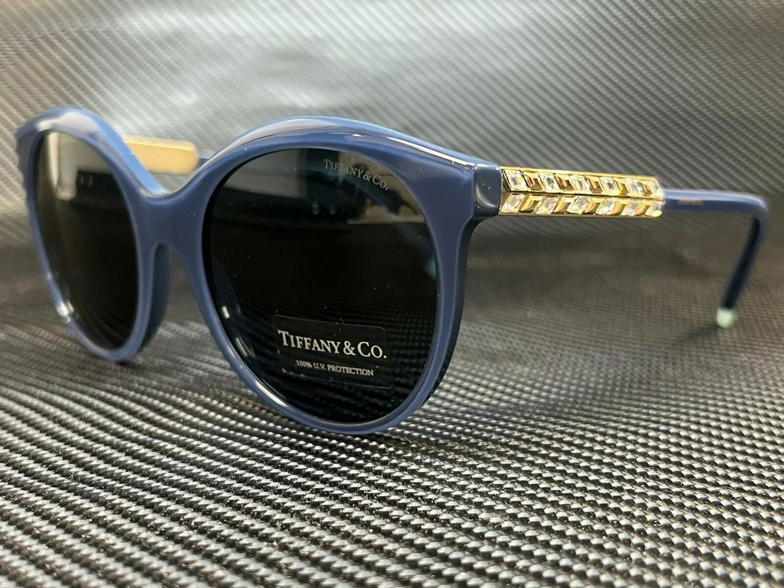 TIFFANY TF4175B 833155 Dark Blue Round Womens 55 mm Sunglasses: TIFFANY TF4175B 833155 Dark Blue Round Womens 55 mm Sunglasses Type: Sunglasses Frame Color: Blue Style: Round New The BIDHAUS Guarantee: All items in this auction are guaranteed to be 100% authentic.