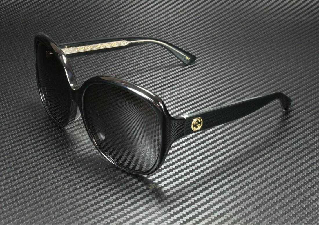 GUCCI GG0080Sk 001 Round Oval Black Grey Womens Sunglasses 61 mm: GUCCI GG0080Sk 001 Round Oval Black Grey Womens Sunglasses 61 mm Lens Material: Plastic Type: Sunglasses Frame Material: Acetate Frame Color: Black New The BIDHAUS Guarantee: All items in this auction
