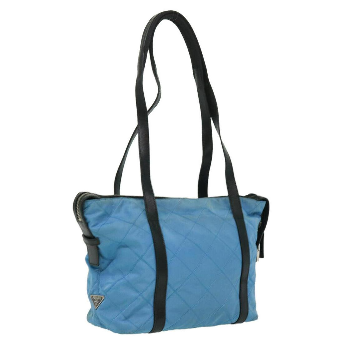 PRADA Quilted Shoulder Bag Nylon Blue: PRADA Quilted Shoulder Bag Nylon Blue Style: Shoulder Bag Material: Nylon Exterior Color: Blue Bag Height: 8.7inch(Approx) / 22cm(Approx) Bag Depth: 3.9inch(Approx) / 10cm(Approx) Bag Length: 9.8inch(