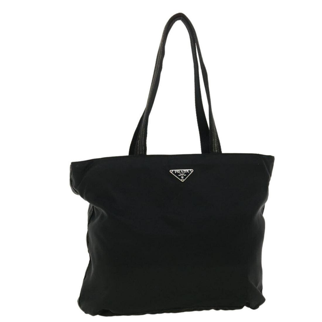 PRADA Shoulder Bag Nylon Black: PRADA Shoulder Bag Nylon Black Style: Shoulder Bag Material: Nylon Exterior Color: Black Bag Height: 10.2inch(Approx) / 26cm(Approx) Bag Depth: 3.1inch(Approx) / 8cm(Approx) Bag Length: 11.8inch(Appro