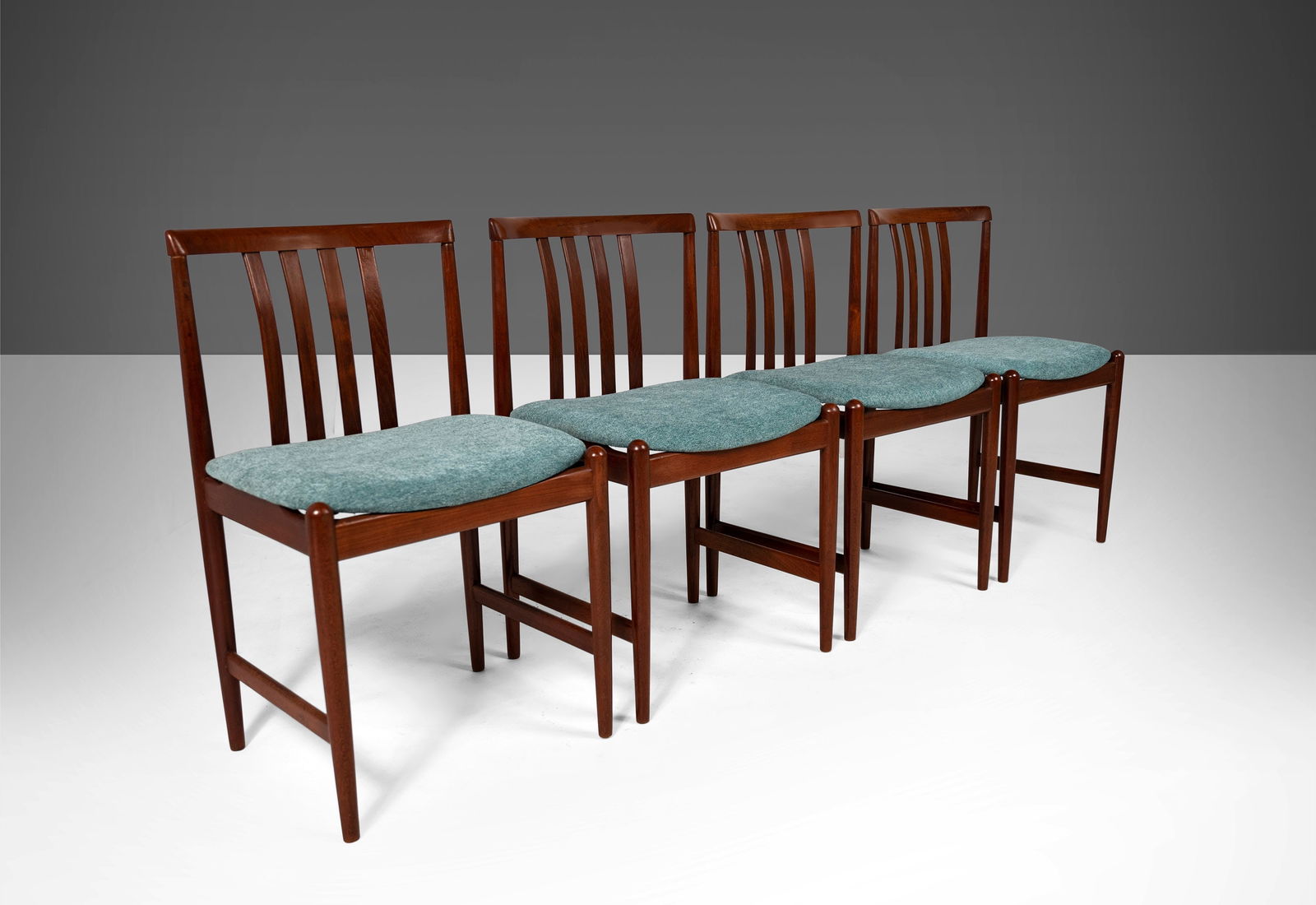 A Set of Four (4) Contoured Rosewood Danish Modern Dining Chairs After Arne Vodder c. 1960: A Set of Four (4) Contoured Rosewood Danish Modern Dining Chairs After Arne Vodder c. 1960 Title: A Set of Four (4) Contoured Rosewood Danish Modern Dining Chairs After Arne Vodder c. 1960About: Elega
