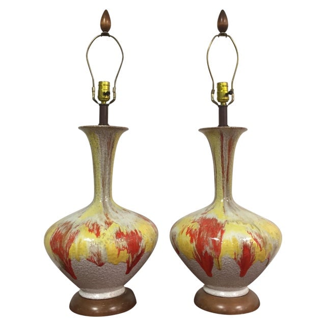 Mid-Century Yellow & Red Table Lamps - A Pair: Mid-Century Yellow & Red Table Lamps - A Pair A pair of mid-century modern yellow and red tall table lamps with a rich heavy glaze and abstract design with walnut bases. Dimensions: 12"W x 12"D x 32.5