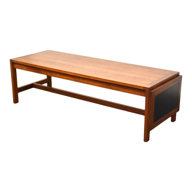France & Son Danish Teak Coffee Table: France & Son Danish Teak Coffee Table A mid century modern teak sliding top coffee table with a black formica leaf that fully extends the table to 71.75" wide. Designed for France and Son in Denmark a