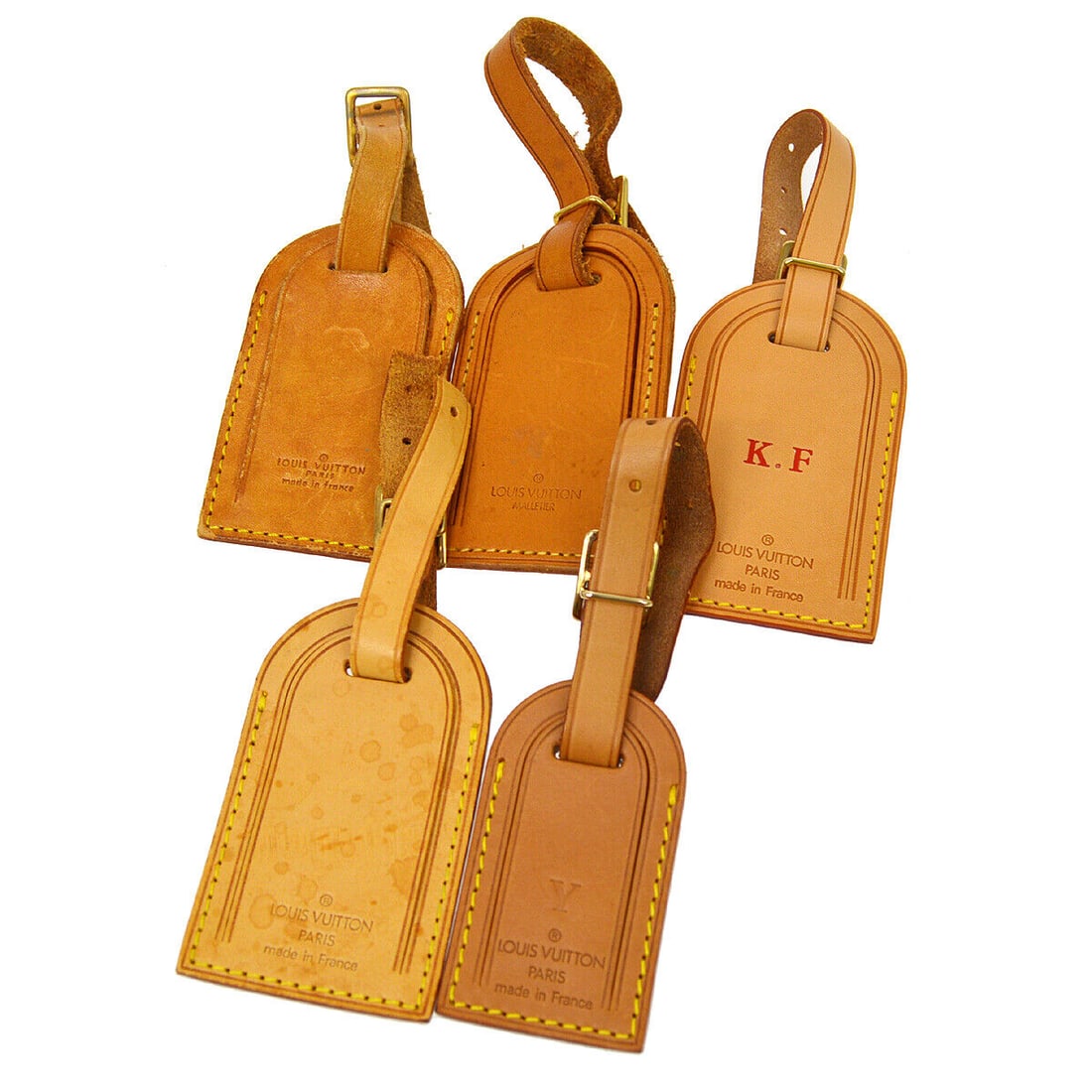 LOUIS VUITTON Name Tag 5 Set Brown Leather Bag Accessories: LOUIS VUITTON Name Tag 5 Set Brown Leather Bag Accessories Type: Name Tag Color: Brown Outside Condition: C: Heavily Used/Inside Condition: C: Heavily Used The BIDHAUS Guarantee: All items in this auc