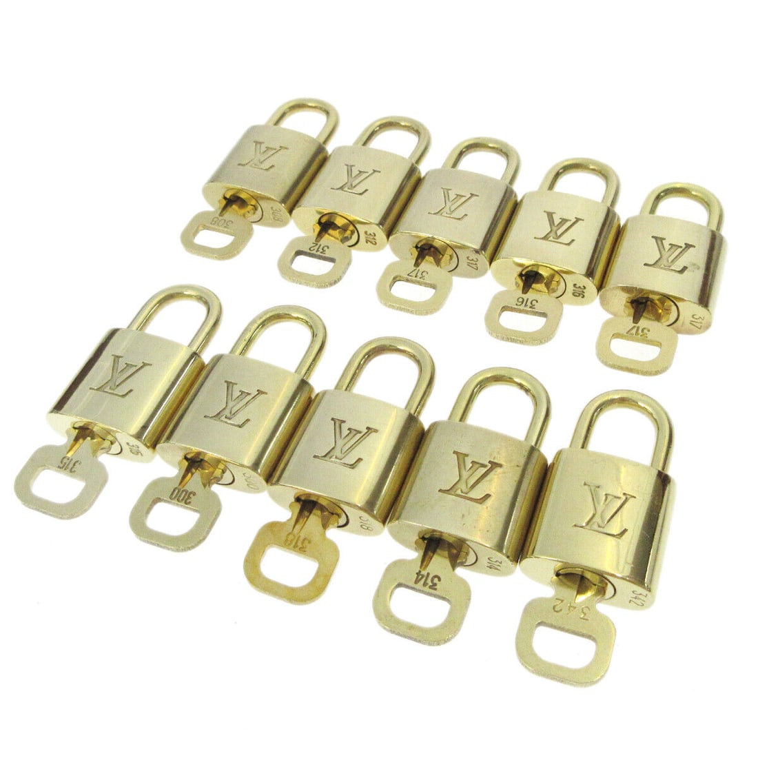 LOUIS VUITTON Padlock & Key Bag Accessories Charm 10 Piece Set Gold: LOUIS VUITTON Padlock & Key Bag Accessories Charm 10 Piece Set Gold Type: Padlock Color: Gold Outside Condition: B: Reasonable Wear and Tear/Inside Condition: C: Heavily Used The BIDHAUS Guarantee: Al