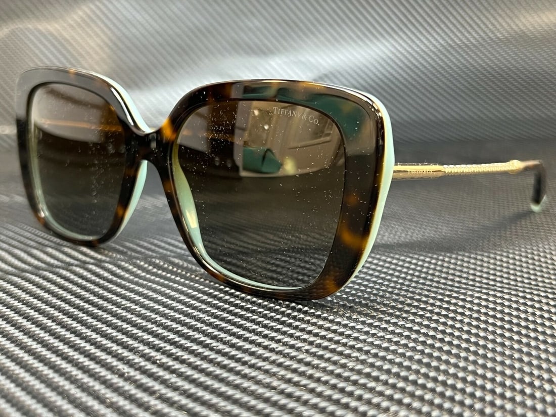 TIFFANY TF4177 8134T5 Havana Square Rectangle Womens 55 mm Polarized Sunglasses: TIFFANY TF4177 8134T5 Havana Square Rectangle Womens 55 mm Polarized Sunglasses Type: Sunglasses Frame Color: Beige Style: Rectangle New The BIDHAUS Guarantee: All items in this auction are guaranteed