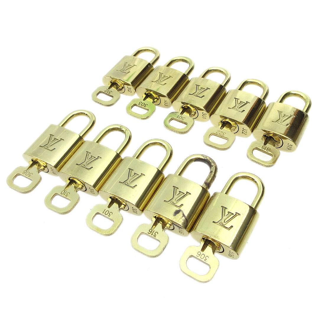 LOUIS VUITTON Padlock & Key Bag Accessories Charm 10 Piece Set Gold: LOUIS VUITTON Padlock & Key Bag Accessories Charm 10 Piece Set Gold Type: Padlock Color: Gold Outside Condition: C: Heavily Used/Inside Condition: C: Heavily Used The BIDHAUS Guarantee: All items in t