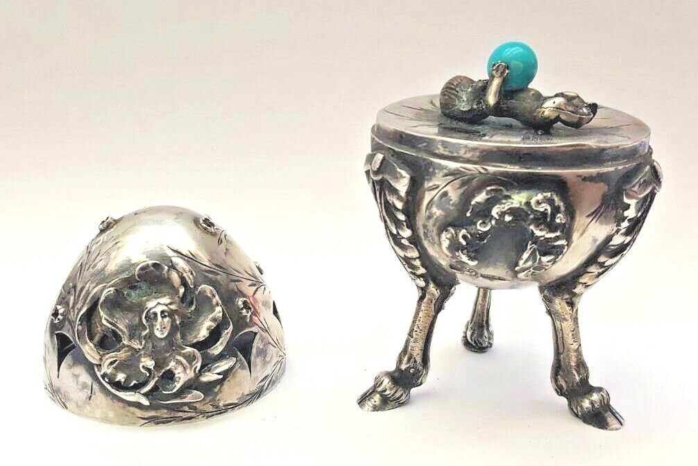 CIRCA 1886 RUSSIAN EGG 84 SILVER WITH RUBY & BLUE STONE: CIRCA 1886 RUSSIAN EGG 84 SILVER WITH RUBY & BLUE STONE Age: 1886 Composition: Sterling Silver Pre-Owned PLEASE NOTE: LOCAL PICK UP IS NOT AN OPTION AND ALL ITEMS IN THIS AUCTION MUST BE SHIPPED. We o