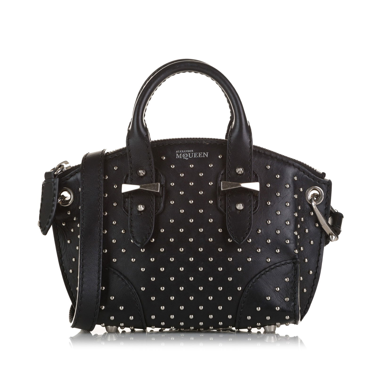 Alexander McQueen Studded Legend Satchel: Alexander McQueen Studded Legend Satchel This satchel features a leather body with stud details rolled leather handles detachable flat strap top zip closure interior zip and slip pocket and studded po