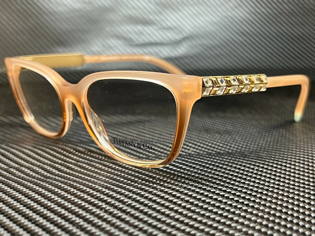 TIFFANY TF2199B 8299 Sand Gradient Demo Lens Womens Eyeglasses Frame 52 mm: TIFFANY TF2199B 8299 Sand Gradient Demo Lens Womens Eyeglasses Frame 52 mm Frame Color: Brown Type: Eyeglasses New The BIDHAUS Guarantee: All items in this auction are guaranteed to be 100% authentic.