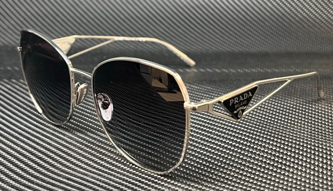 PRADA PR 57YS 1BC5D1 Silver Grey Gradient Womens 57 mm Sunglasses: PRADA PR 57YS 1BC5D1 Silver Grey Gradient Womens 57 mm Sunglasses Frame Color: Silver Type: Sunglasses New The BIDHAUS Guarantee: All items in this auction are guaranteed to be 100% authentic. At Your
