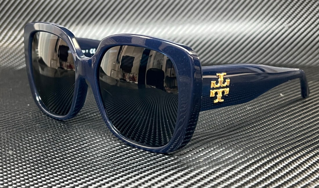 TORY BURCH TY7112UM 165680 Navy Blue Womens 57 mm Sunglasses: TORY BURCH TY7112UM 165680 Navy Blue Womens 57 mm Sunglasses Frame Color: Blue Type: Sunglasses New The BIDHAUS Guarantee: All items in this auction are guaranteed to be 100% authentic. At Your Servic