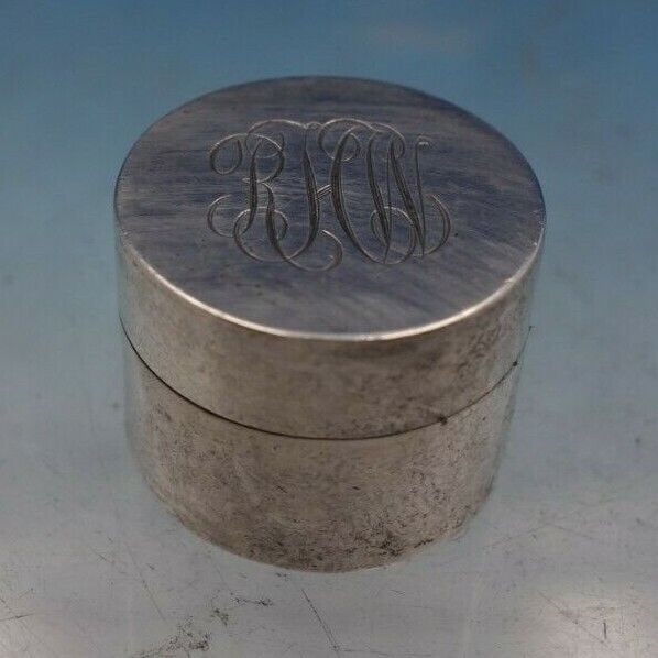 Leonore Doskow Sterling Silver Pill Box 1" x 3/4" Diameter Plain Small: Leonore Doskow Sterling Silver Pill Box 1" x 3/4" Diameter Plain Small Simple sterling silver pill box by leonore doskow. This box measures 3/4" tall x 1" diameter and weighs 0. 4 troy ounces. It is m
