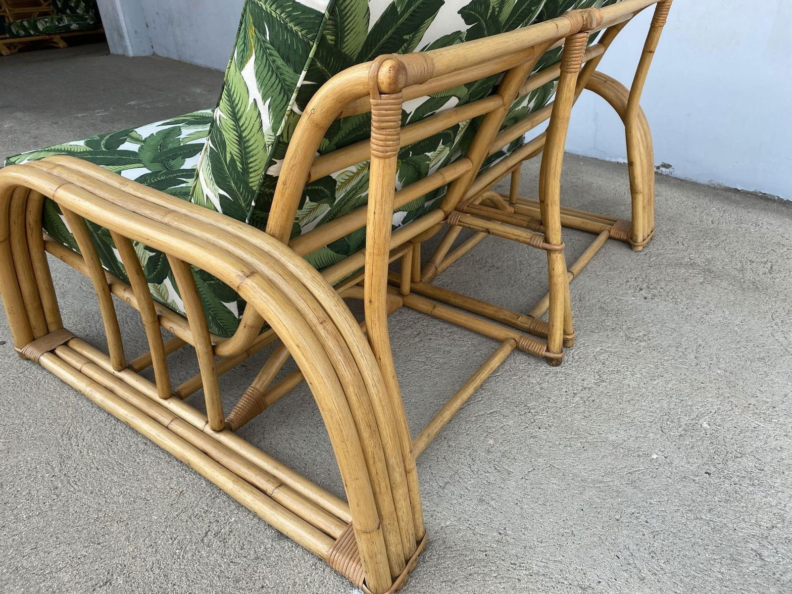 Restored Vintage Paul Laszlo Rattan Three Strand Sectional Settee Sofa: Restored Vintage Paul Laszlo Rattan Three Strand Sectional Settee Sofa Dimensions: Height: 28 in (71.12 cm)Width: 55 in (139.7 cm)Depth: 40 in (101.6 cm)Seat Height: 17 in (43.18 cm) Materials and Tec